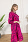 Spring Carnival Ruffle Dress in boysenberry color