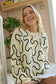 Twist of West Knitted Sweater in Canyon White