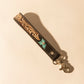 Myra Wildhue Western Key Fob in black with turquoise floral handtooled detail