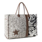 Myra Wildstar Pony Western Weekender Bag for Women in white with hairon detail
