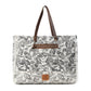 Myra Wildfern Hide Western Weekender Bag for Women in ivory with hairon detail
