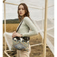 Myra Tufts Pattern Woven Hairon Crossbody â€“ Tribal Geometric Print with Leather Strap and Studded Accents